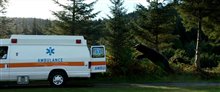 COCAINE BEAR Movie Clip - Cocaine Bear chases down an ambulance Video